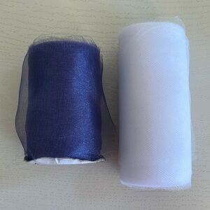 Roll of White Tulle and Roll Purple Decorative Scarfing